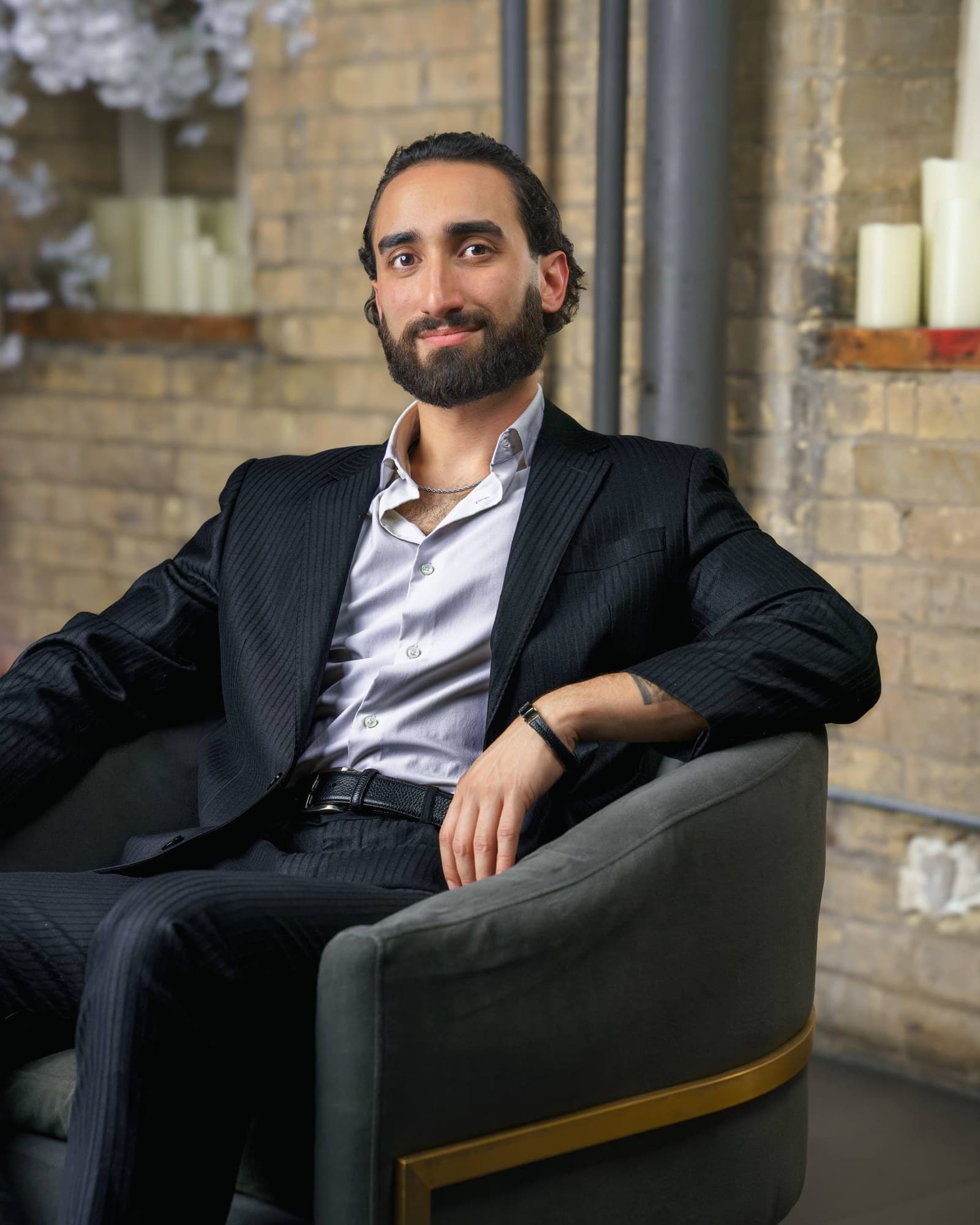 Kiarash Goodarzi, principal of Trust Financials Limited, seated in a Toronto office